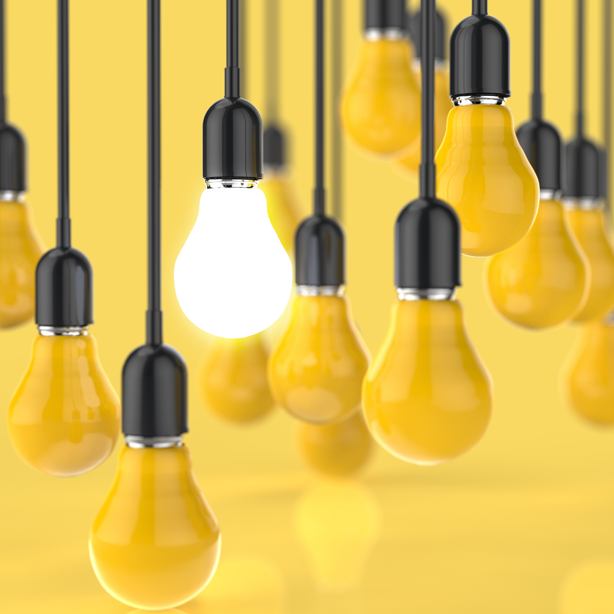 Light bulbs on yellow background